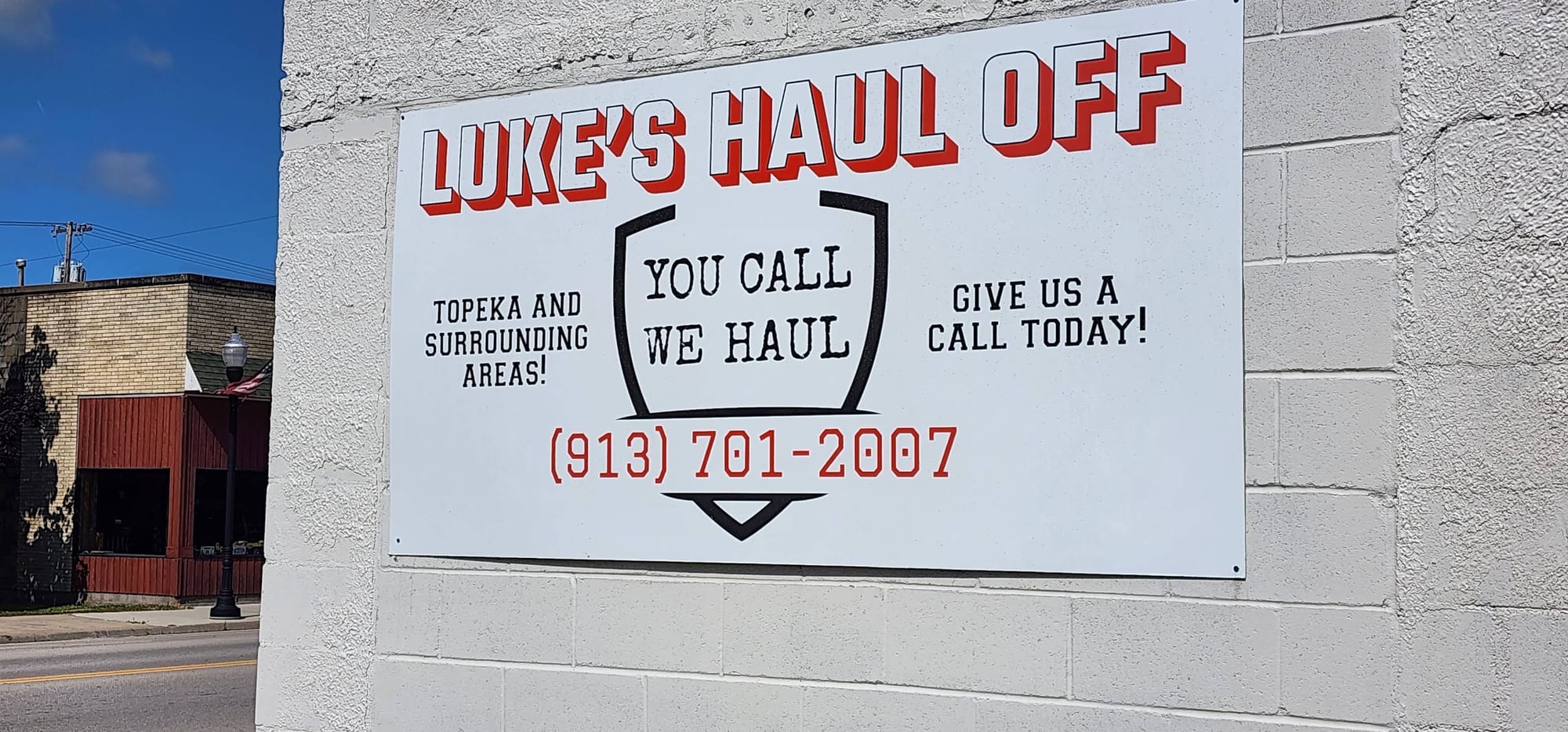 Luke's Haul Off sign on the shop in St. Marys
